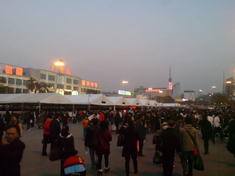 Crowds of travellers outside Guangzhou railway station during the Chinese New Year travel rush (chunyun)