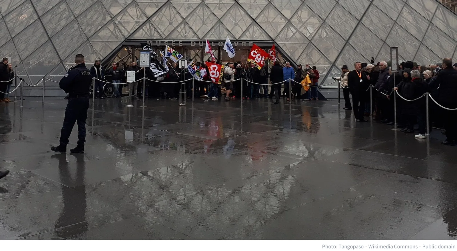 Strikers blocking the entrance to the Louvre Pyramid in Paris