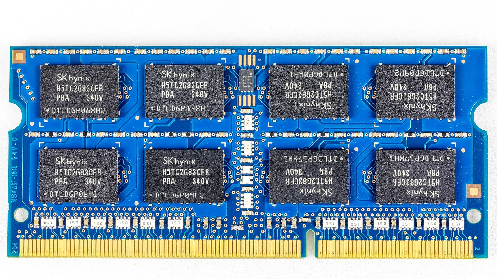 SK hynix 4GB DDR3L SO-DIMM memory module with eight SK hynix DRAM chips on a blue board.