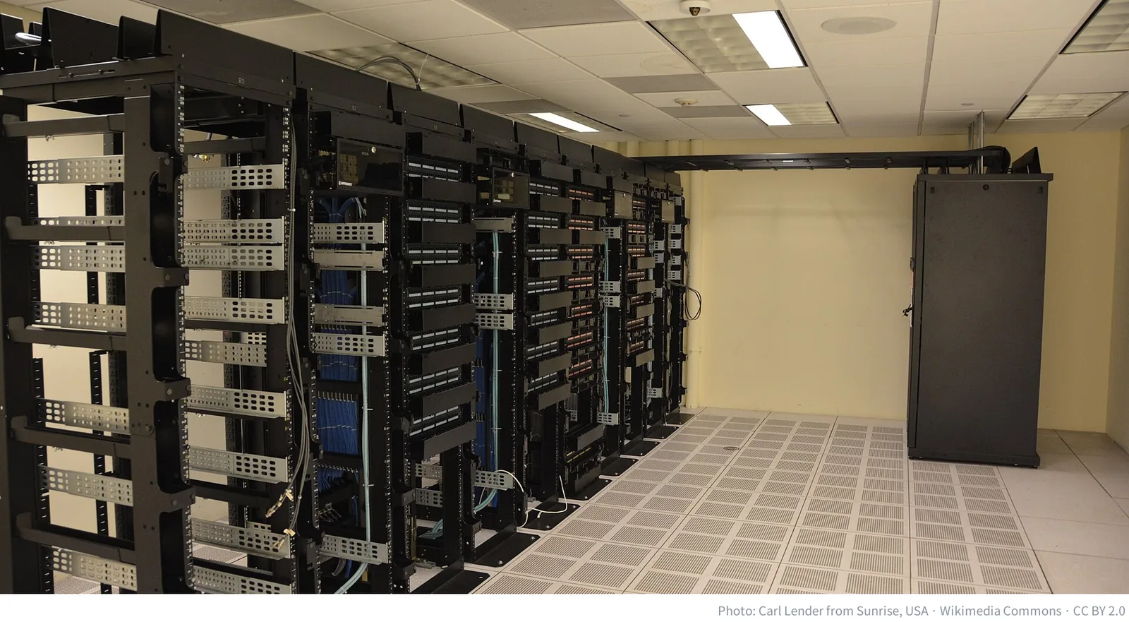 Rows of server racks in a data center